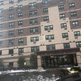 A multi-story residential apartment building showcasing modern architectural design.