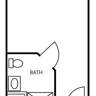 A simple floor plan featuring a small bathroom with basic fixtures.