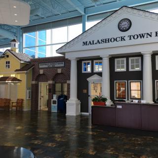 An interior view of Malashock Town Hall, showcasing unique architectural designs.