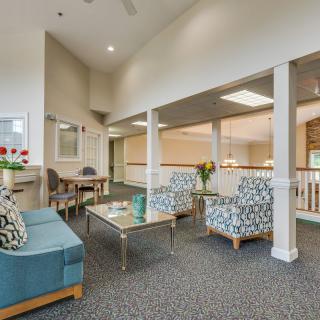 A modern and spacious lobby area with comfortable seating and elegant decor.