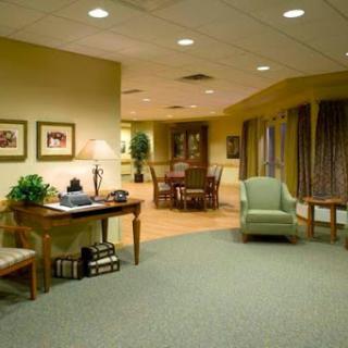 A warm and inviting lobby area featuring comfortable seating and tasteful decor.