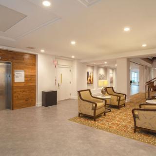 A welcoming lobby area featuring comfortable seating and modern decor.