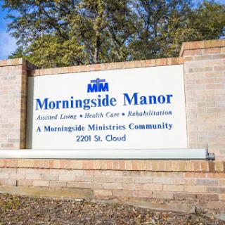 Welcome sign for Morningside Manor, a community focused on assisted living and healthcare services.