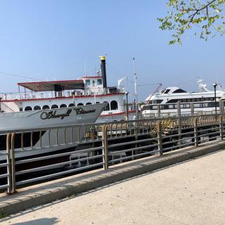 Boats docked at the pier on a sunny day.