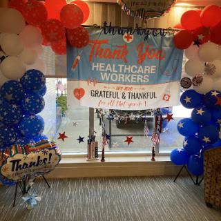 A festive decoration setup to honor and thank healthcare workers.