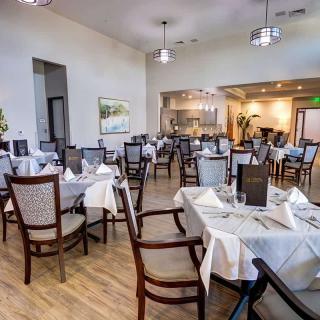 An elegant dining room with neatly arranged tables and stylish decor.