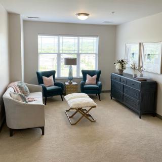 A cozy living room with modern furniture and natural light.