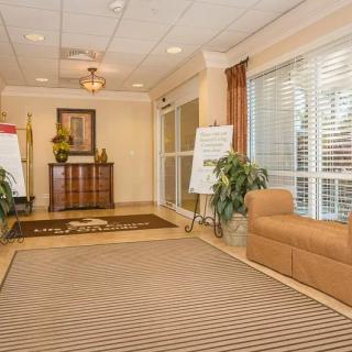 A welcoming lobby with comfortable seating and decor.