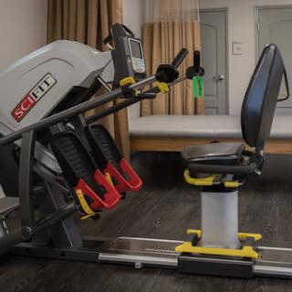 A well-equipped rehabilitation exercise machine designed for strength training.