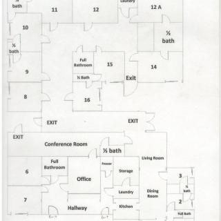 An office floor plan depicting various rooms including a conference room, bathrooms, and a kitchen.