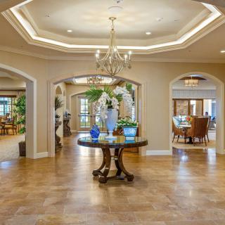 Luxurious entryway with elegant lighting and tasteful decor.