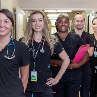 A group of healthcare professionals in a hospital setting.