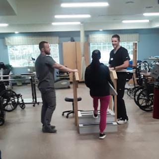 A physical therapy session in progress, focusing on patient rehabilitation.