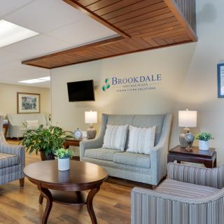 A cozy and welcoming lobby area with comfortable seating and tasteful decor.