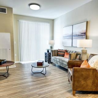 A modern living room with stylish furnishings and decor.