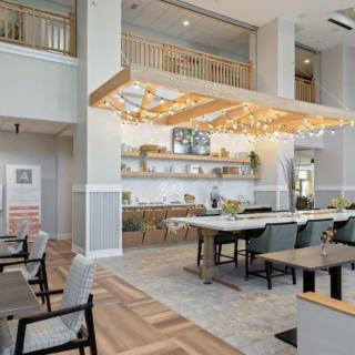 A modern dining area with stylish lighting and contemporary decor.