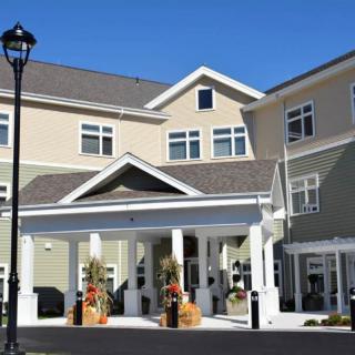 A modern residential building with a welcoming entrance.