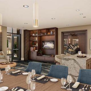 A modern and elegantly designed dining room with a sophisticated table setting.