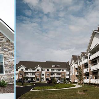 Image of a residential apartment complex with multiple buildings under a partly cloudy sky.