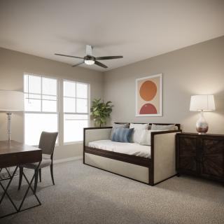 A modern and minimalist bedroom featuring a stylish daybed, desk, and lighting.
