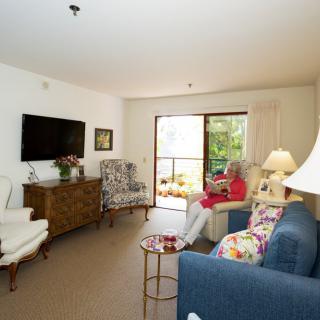 A cozy living room with comfortable seating and a television.