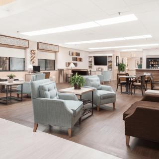 A modern and comfortable lounge area featuring stylish furniture and spacious design.