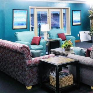 A cozy living room with comfortable seating and stylish decor.