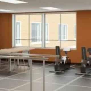 An indoor workout space with fitness equipment and exercise machines.