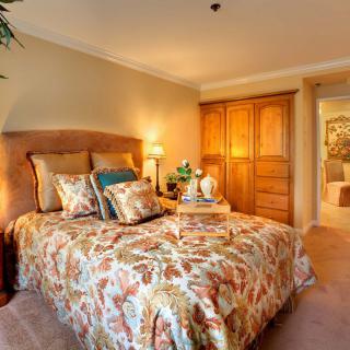 A beautifully decorated bedroom with a warm and cozy ambiance.