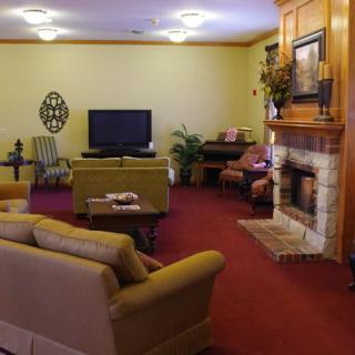 Cozy living room with a fireplace and comfortable seating.