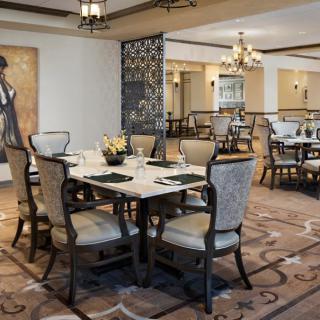 Elegant dining area with stylish furnishings and a warm ambiance.