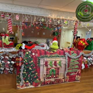 A beautifully decorated area for Christmas featuring a festive theme with vibrant colors and holiday imagery.