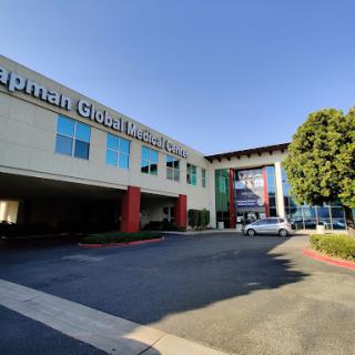 Exterior view of a modern commercial building with clear signage.