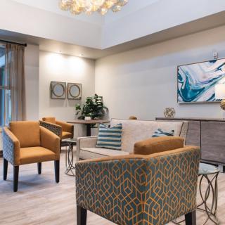 A modern living room with comfortable seating and stylish decor.