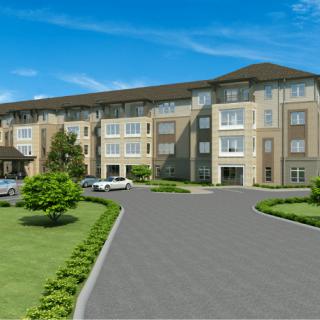 A modern apartment complex with well-maintained landscaping and a spacious parking area.
