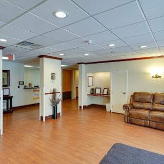 A spacious and welcoming waiting room designed for comfort and relaxation.