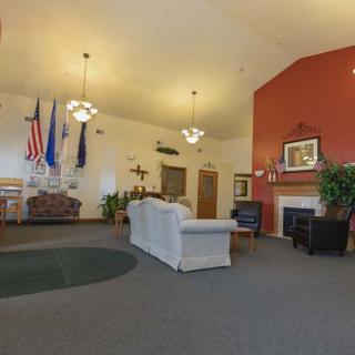 A spacious lobby area with comfortable seating and decorative elements.