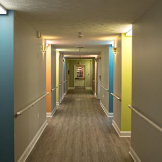 A brightly colored hallway showcasing a blend of hues and modern design.