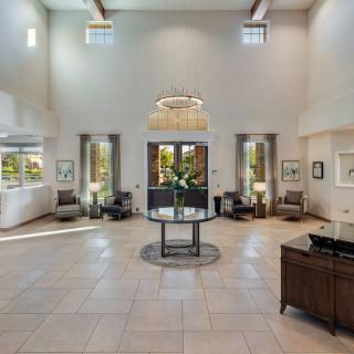 A modern and spacious lobby with elegant furniture and stylish decor.