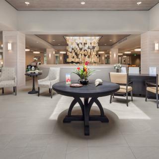 A modern lobby area with comfortable seating and elegant decor.