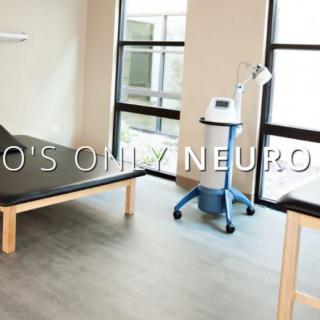 A medical treatment room equipped for neuroscience care.