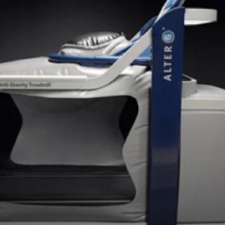 A side view of an AlterG anti-gravity treadmill designed for rehabilitation and exercise.
