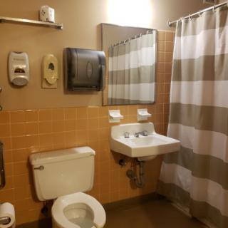 Clean and functional bathroom with essential amenities.
