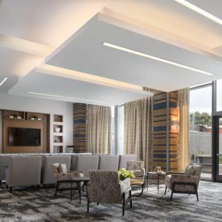 A modern living room with stylish furniture and contemporary lighting.