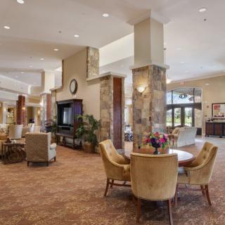 A well-decorated lobby with comfortable seating and elegant decor.