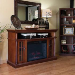 A stylish wooden electric fireplace in a cozy living room setting.