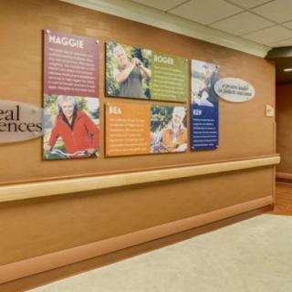 A hospital hallway featuring colorful informational boards about medical science.