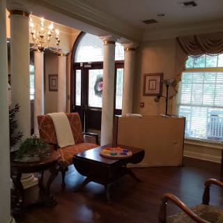 A cozy living room with elegant furnishings and a welcoming atmosphere.