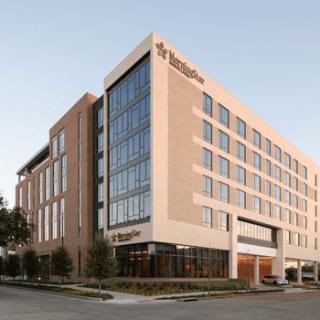 A modern hotel building with a sleek design.