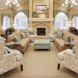 Elegant living room with traditional decor and a cozy fireplace.